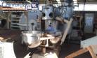 Sistema de cozimento � v�cuo para balas