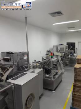 Linha para embalagem farmac�utica blistadeira encartuchadeira Uhlmann